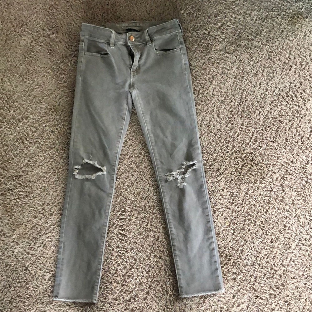 tan almost grey american eagle skinny jeans